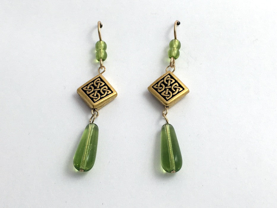 Gold tone Pewter & 14kgf Celtic Knot dangle earrings- green glass, knots, 2 1/4"